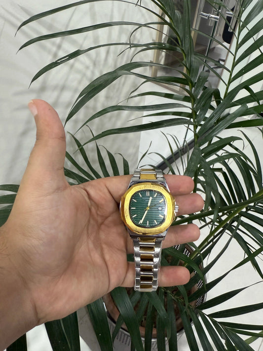 Patek Philippe Nautilus Two Tone Gold and Silver Watch
